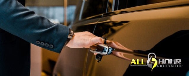 Top-Rated Automotive Locksmith Services in Midvale, Utah - All Hour Locksmith Man trying to open a car door - Automotive Locksmith Services in Midvale, Utah